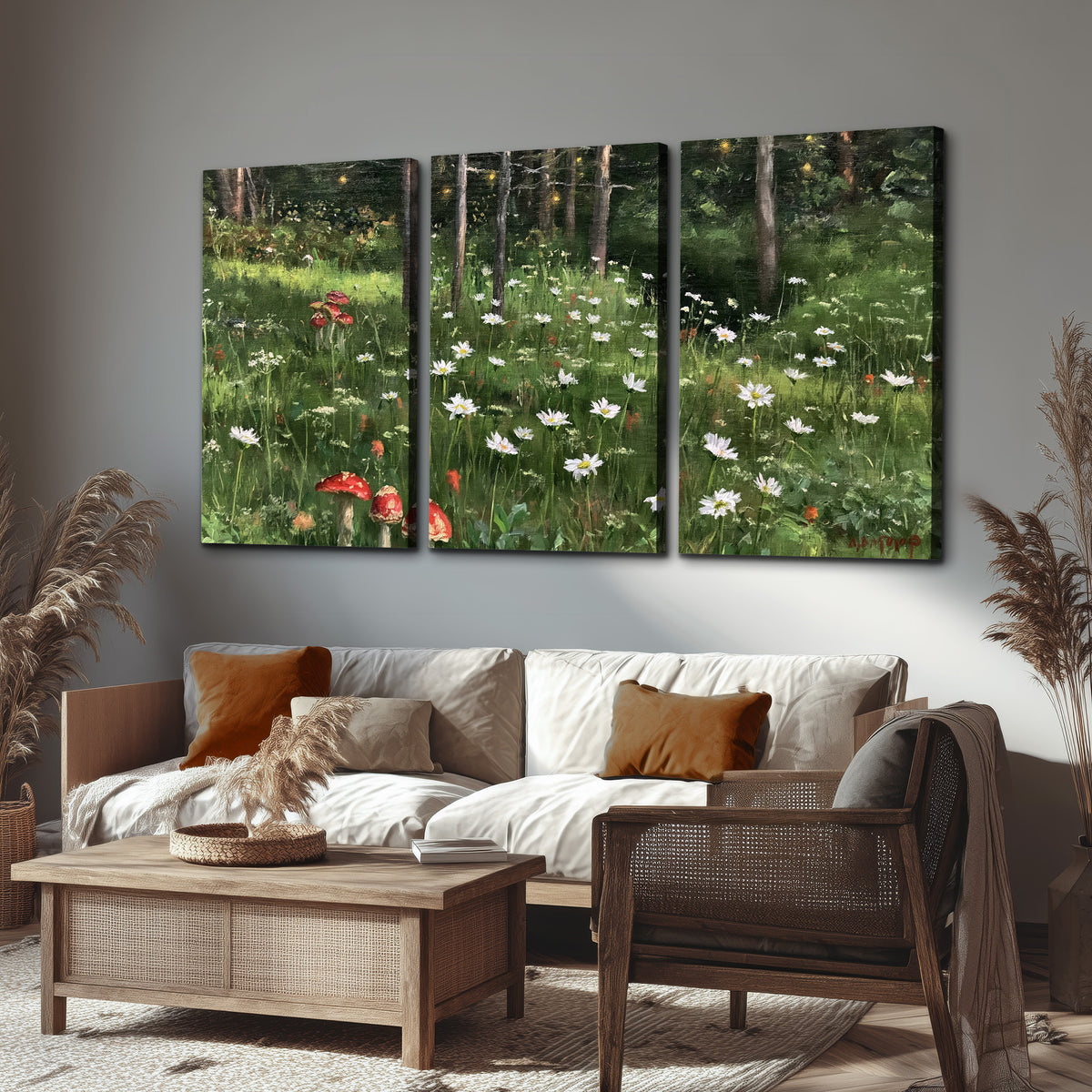 A green woodland floor covered with small white daisies and red mushroom accents 3 piece canvas wall art displayed in a rustic living room