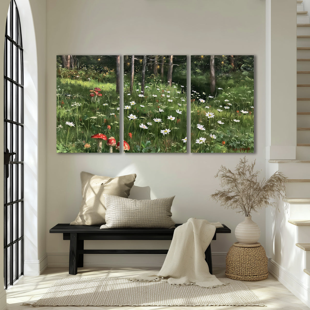 A green woodland floor covered with small white daisies and red mushroom accents 3 piece canvas wall art displayed in a entryway