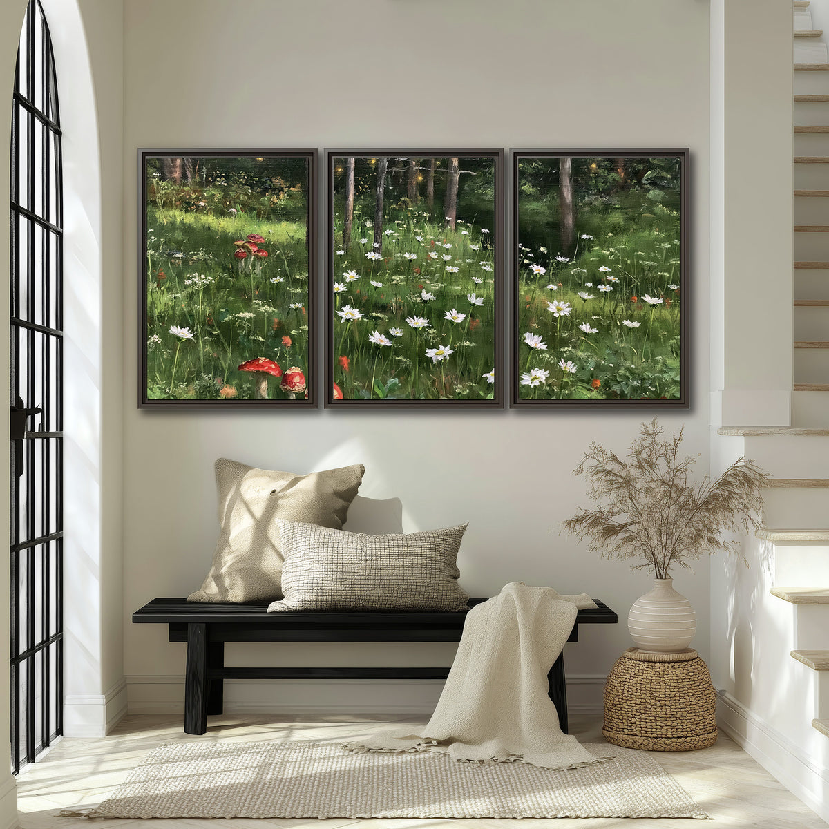 A green woodland floor covered with small white daisies and red mushroom accents 3 piece framed canvas wall art displayed in a entryway