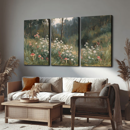 A soft woodland meadow filled with pale flowers and scattered warm red accents 3 piece canvas wall art displayed in a rustic living room