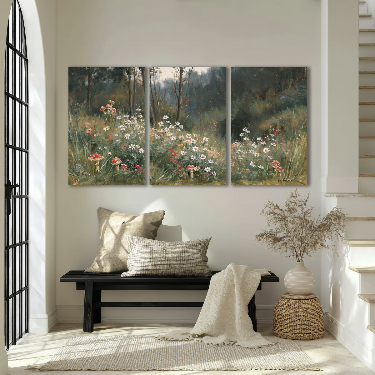 A soft woodland meadow filled with pale flowers and scattered warm red accents 3 piece canvas wall art displayed in a entryway