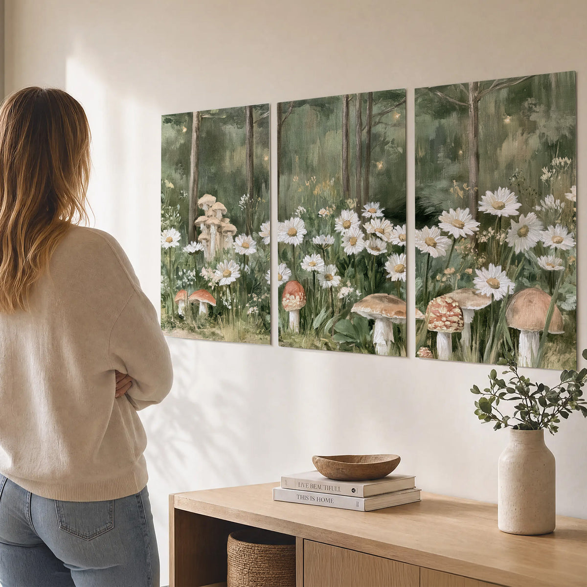 Pale pink mushrooms nestled among white daisies and tall green woodland grasses set of 3 poster prints three panel arrangement on a wall