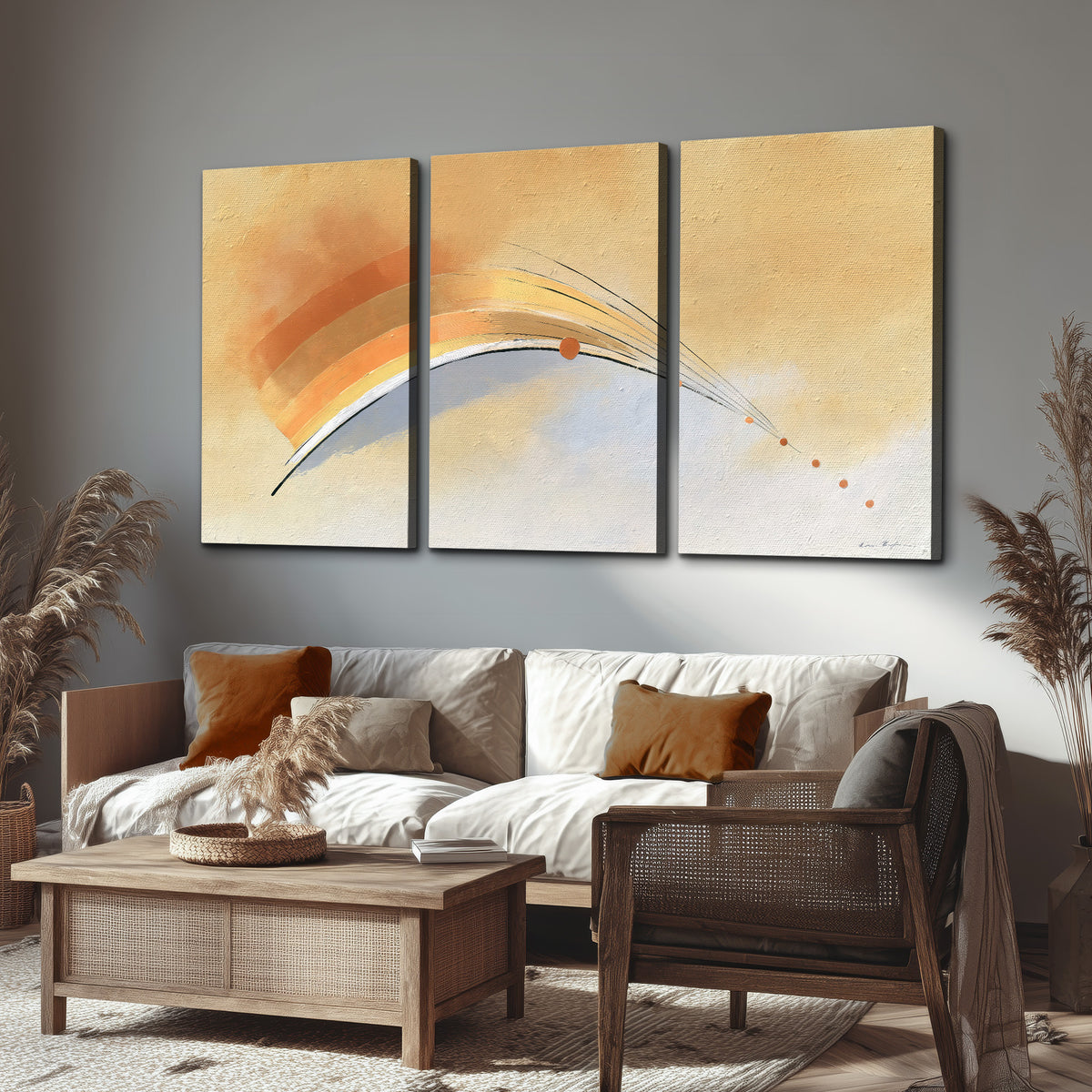 A sweeping ochre and orange arc with fine blue accents on a warm cream background 3 piece canvas wall art displayed in a rustic living room