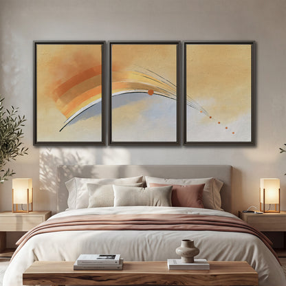 A sweeping ochre and orange arc with fine blue accents on a warm cream background 3 piece framed canvas wall art displayed in a bedroom