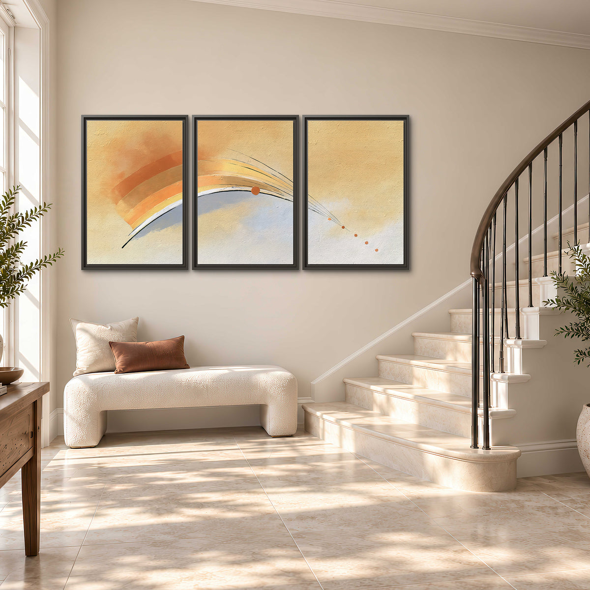 A sweeping ochre and orange arc with fine blue accents on a warm cream background 3 piece framed canvas wall art styled in an interior