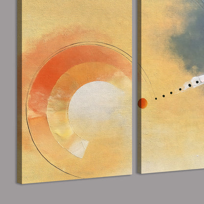 A warm orange circular form and diagonal pale streaks across a muted yellow and blue field 3 piece canvas wall art room and product view