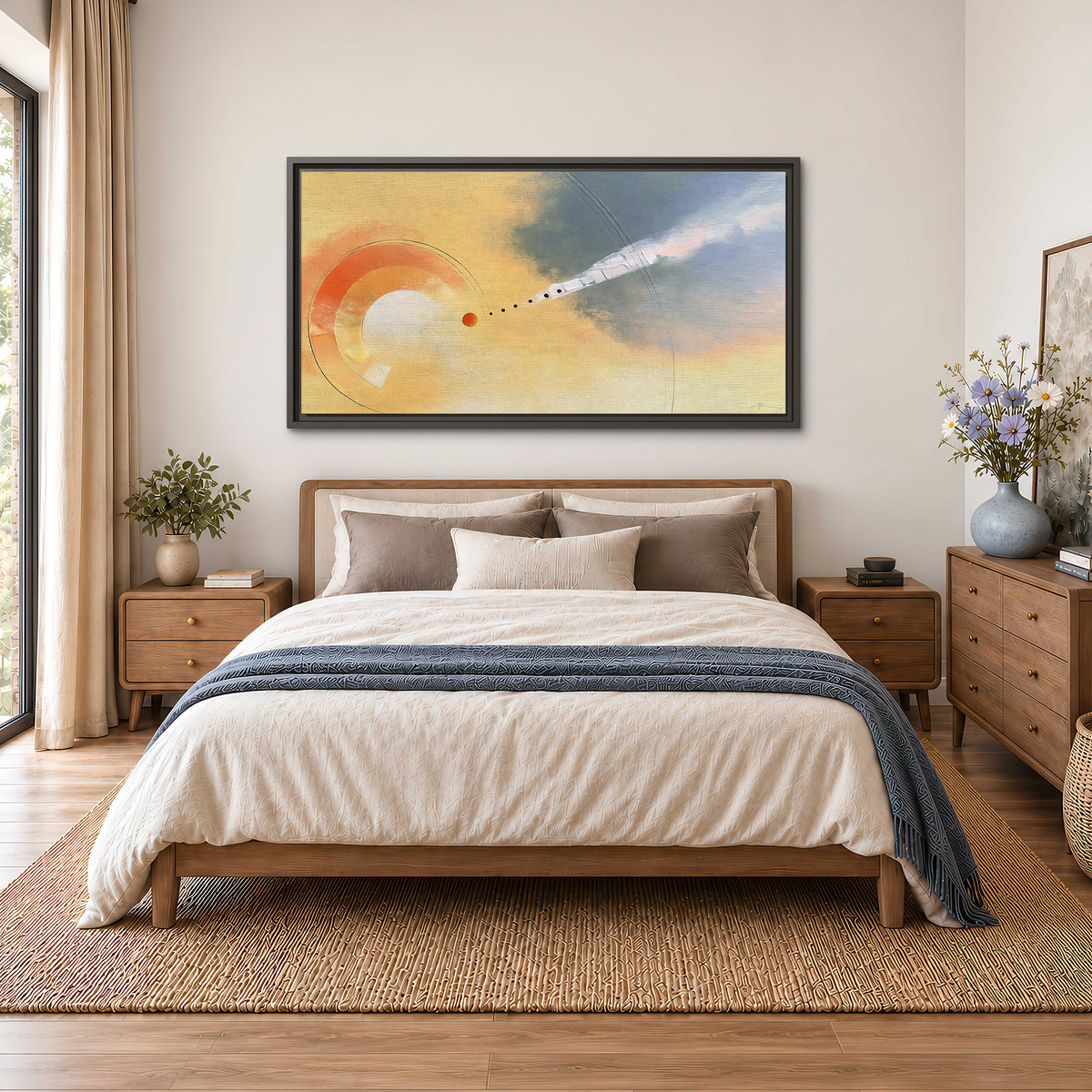 A warm orange circular form and diagonal pale streaks across a muted yellow and blue field single framed canvas wall art styled in an interior