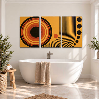 Bold black, orange and golden circles with parallel curved lines and small dots 3 piece canvas wall art styled in an interior