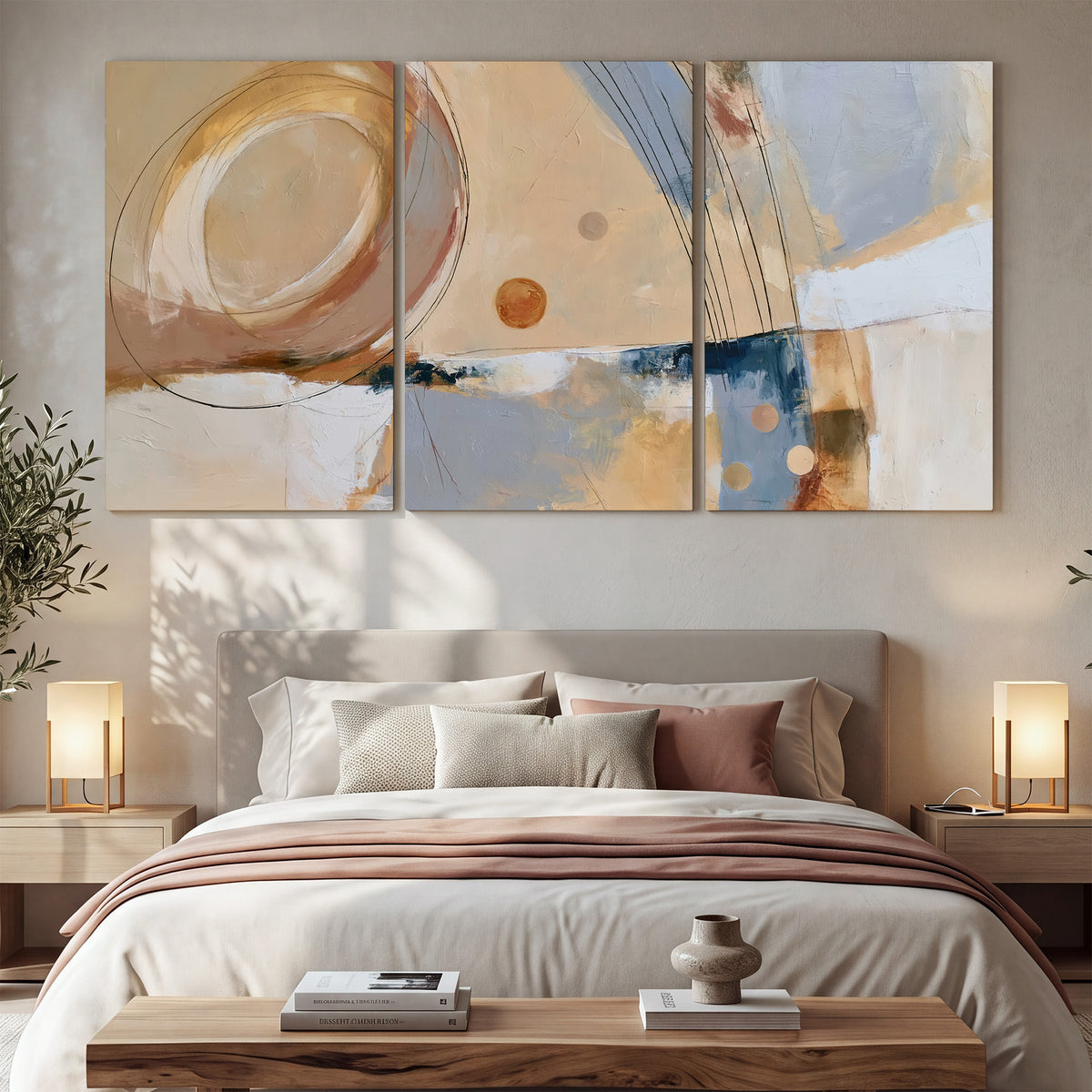 Pale circular forms and fine diagonal lines layered over blue, peach and cream brushstrokes 3 piece canvas wall art displayed in a bedroom