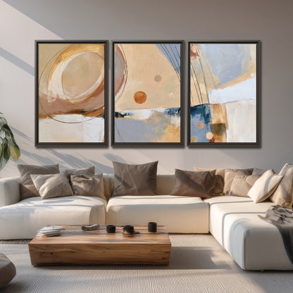 Pale circular forms and fine diagonal lines layered over blue, peach and cream brushstrokes 3 piece framed canvas wall art displayed in a living room