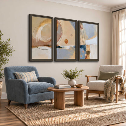Pale circular forms and fine diagonal lines layered over blue, peach and cream brushstrokes 3 piece framed canvas wall art styled in an interior
