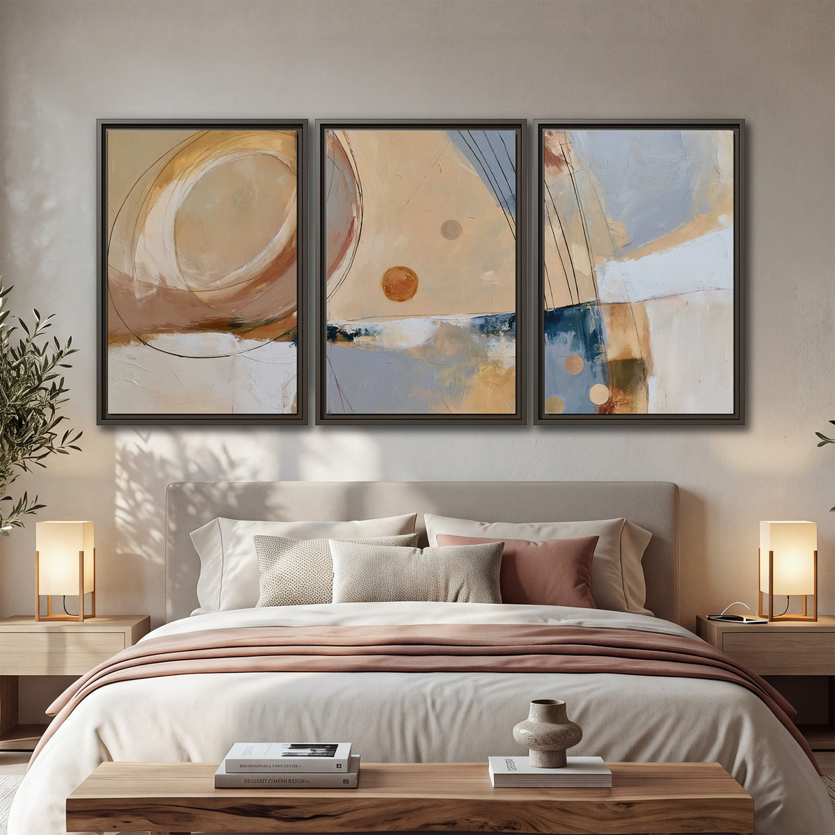 Pale circular forms and fine diagonal lines layered over blue, peach and cream brushstrokes 3 piece framed canvas wall art displayed in a bedroom