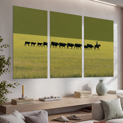 A rider leading a long line of cattle across a wide green and golden plain set of 3 poster prints displayed in a console