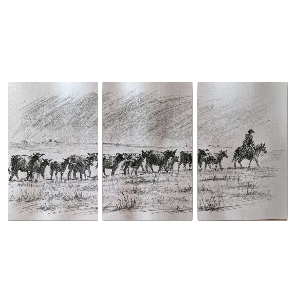 A rider on horseback guiding a herd of cattle across an open plain in charcoal-style strokes 3 piece canvas wall art viewed straight on