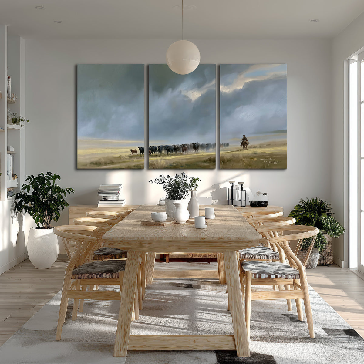 A rider and cattle moving across a sunlit grassland beneath a dramatic blue-gray sky 3 piece canvas wall art room and product view