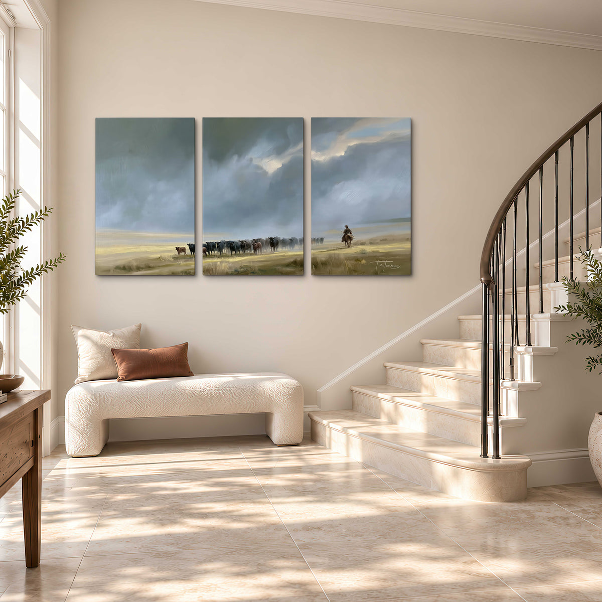 A rider and cattle moving across a sunlit grassland beneath a dramatic blue-gray sky 3 piece canvas wall art styled in an interior