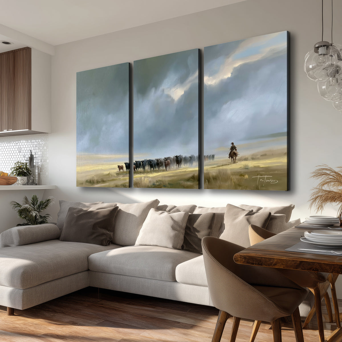A rider and cattle moving across a sunlit grassland beneath a dramatic blue-gray sky 3 piece canvas wall art room and product view