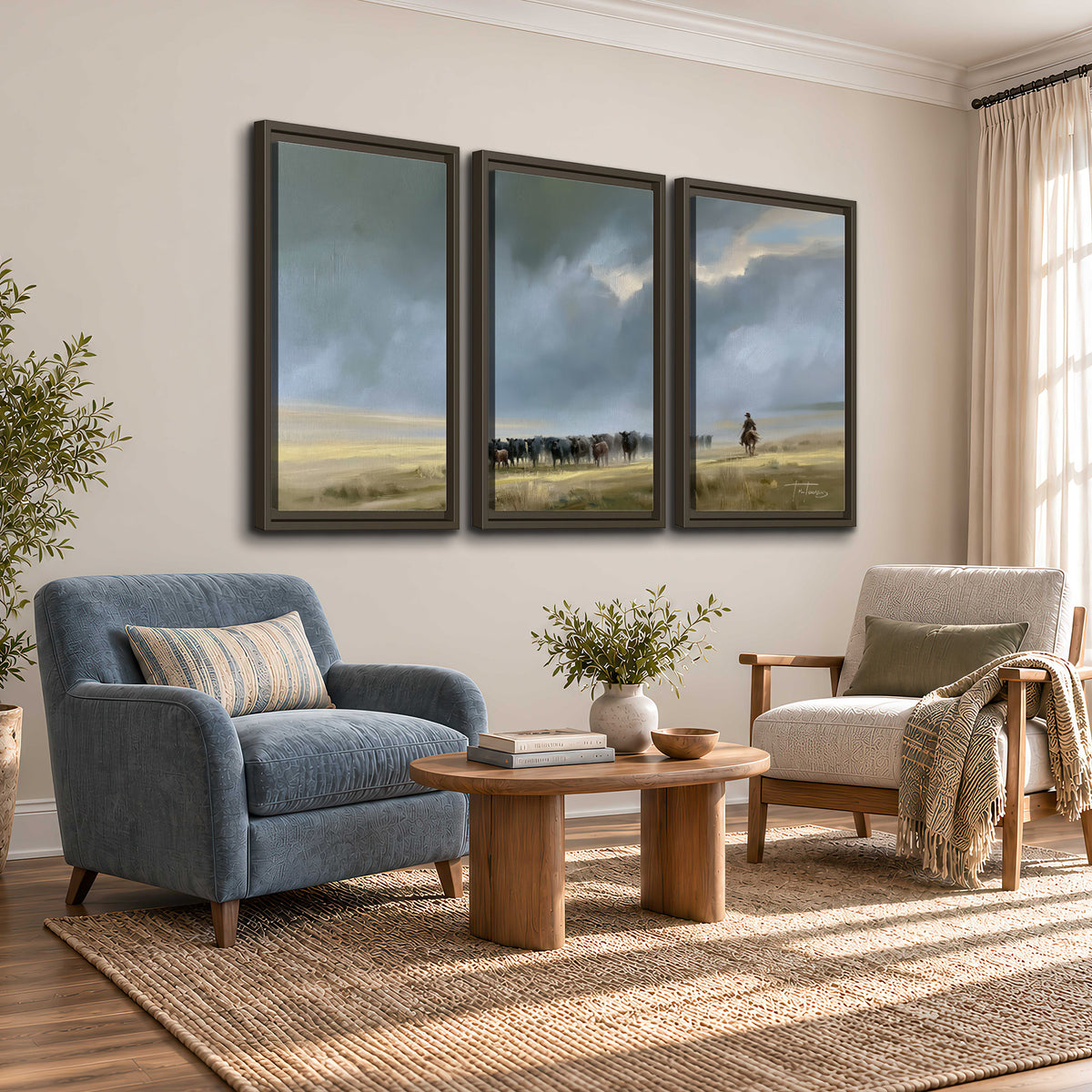 A rider and cattle moving across a sunlit grassland beneath a dramatic blue-gray sky 3 piece framed canvas wall art styled in an interior