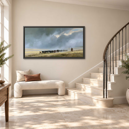 A rider and cattle moving across a sunlit grassland beneath a dramatic blue-gray sky single framed canvas wall art styled in an interior